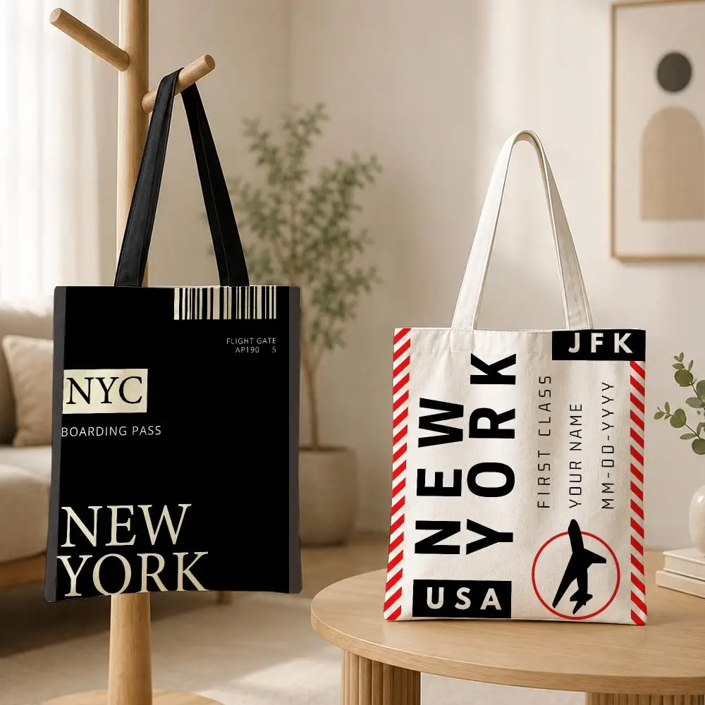 Travel Accessories New York - กระเป๋าผ้าแคนวาสสำหรับผู้หญิง ลายบัตรผ่านขึ้นเครื่องนิวยอร์ก กระเป๋าสะพายไหล่แบบใช้ซ้ำได้สำหรับซื้อของ ไปโรงเรียน ทำงาน ท่องเที่ยว